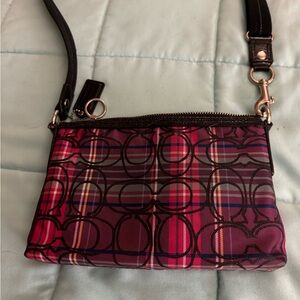 Pink and black checkered Coach purse